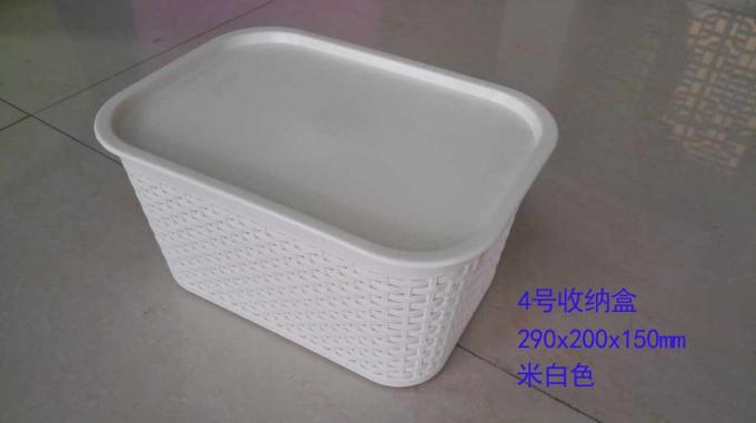 Contenedores de almacenamiento plásticos amarillos con las tapas/los